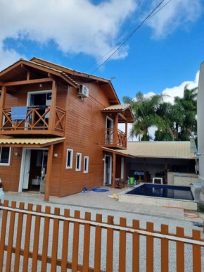 Casa com Piscina em Zimbros